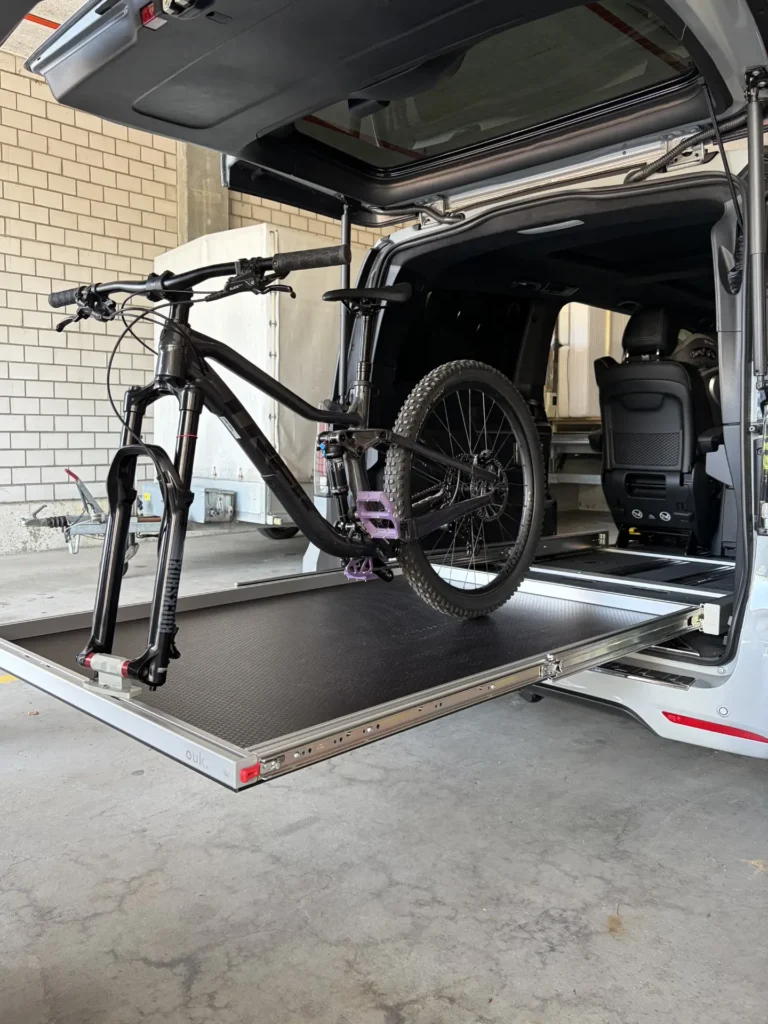 Bike transport inside vehicle - sliding tray in Mercedes V-class, installation in Basel, Switzerland